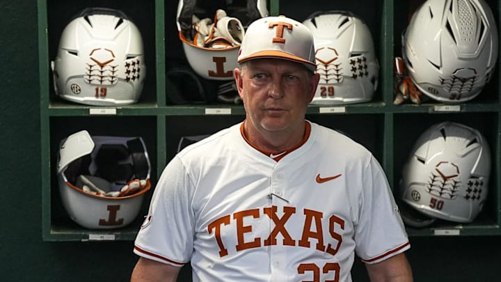 Texas Longhorns head coach Jim Schlossnagle stands in the dugout ahead of the Lone Star Showdown.