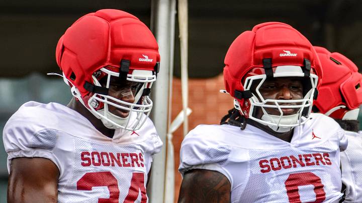 Oklahoma defensive linemen Adepoju Adebawore and David Stone prepare to go through a drill during preseason camp. Adebawore's role is expected to increase significantly this season. Oklahoma defensive linemen Adepoju Adebawore and David Stone prepare to go through a drill during preseason camp. Adebawore's role is expected to increase significantly this season.
