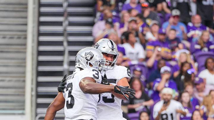 Aug 10, 2024; Minneapolis, Minnesota, USA; Las Vegas Raiders running back Zamir White (3) celebrates his touchdown against the Minnesota Vikings in the second quarter at U.S. Bank Stadium. Mandatory Credit: Brad Rempel-USA TODAY Sports