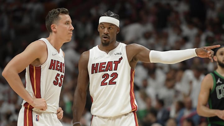 May 25, 2022; Miami, Florida, USA; Miami Heat forward Jimmy Butler (22) talks with guard Duncan Robinson (55) during the fourth quarter of game five of the 2022 eastern conference finals against the Miami Heat at FTX Arena. Mandatory Credit: Jim Rassol-Imagn Images May 25, 2022; Miami, Florida, USA; Miami Heat forward Jimmy Butler (22) talks with guard Duncan Robinson (55) during the fourth quarter of game five of the 2022 eastern conference finals against the Miami Heat at FTX Arena. Mandatory Credit: Jim Rassol-Imagn Images
