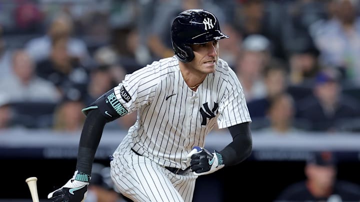 Sep 11, 2025; Bronx, New York, USA; New York Yankees center fielder Cody Bellinger (35) follows through on an RBI single against the Detroit Tigers during the fourth inning at Yankee Stadium. Mandatory Credit: Brad Penner-Imagn Images