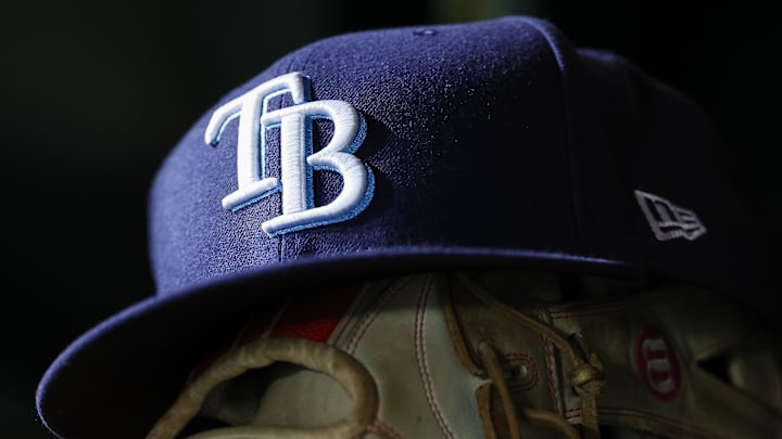 Apr 3, 2023; Washington, District of Columbia, USA; A general view of a Tampa Bay Rays hat and glove during the seventh inning of the game against the Washington Nationals at Nationals Park. Apr 3, 2023; Washington, District of Columbia, USA; A general view of a Tampa Bay Rays hat and glove during the seventh inning of the game against the Washington Nationals at Nationals Park.