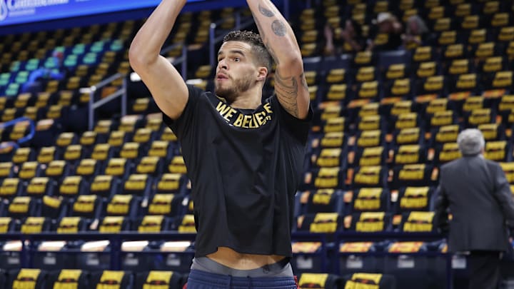 May 7, 2025; Oklahoma City, Oklahoma, USA; Denver Nuggets forward Michael Porter Jr. warms up before the start of game two of the second round against the Oklahoma City Thunder for the 2025 NBA Playoffs at Paycom Center. Mandatory Credit: Alonzo Adams-Imagn Images May 7, 2025; Oklahoma City, Oklahoma, USA; Denver Nuggets forward Michael Porter Jr. warms up before the start of game two of the second round against the Oklahoma City Thunder for the 2025 NBA Playoffs at Paycom Center. Mandatory Credit: Alonzo Adams-Imagn Images