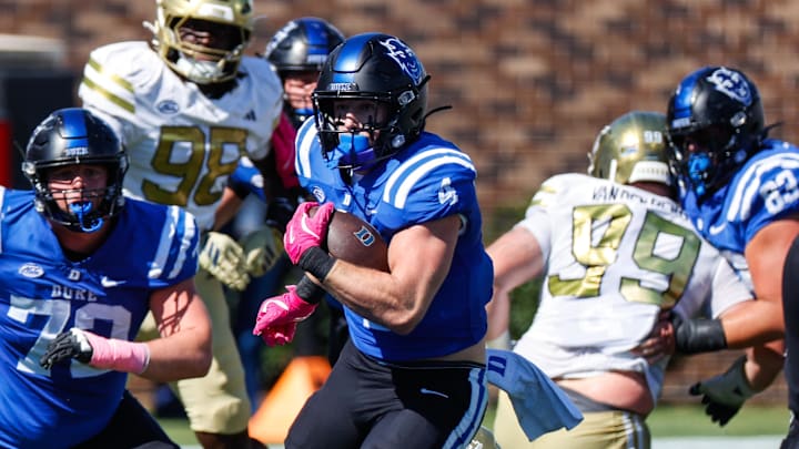 Oct 18, 2025; Durham, North Carolina, USA; Duke Blue Devils running back Anderson Castle (4) runs with the ball during the first half of the game against Georgia Tech Yellow Jackets at Wallace Wade Stadium. Mandatory Credit: Jaylynn Nash-Imagn Images Oct 18, 2025; Durham, North Carolina, USA; Duke Blue Devils running back Anderson Castle (4) runs with the ball during the first half of the game against Georgia Tech Yellow Jackets at Wallace Wade Stadium. Mandatory Credit: Jaylynn Nash-Imagn Images