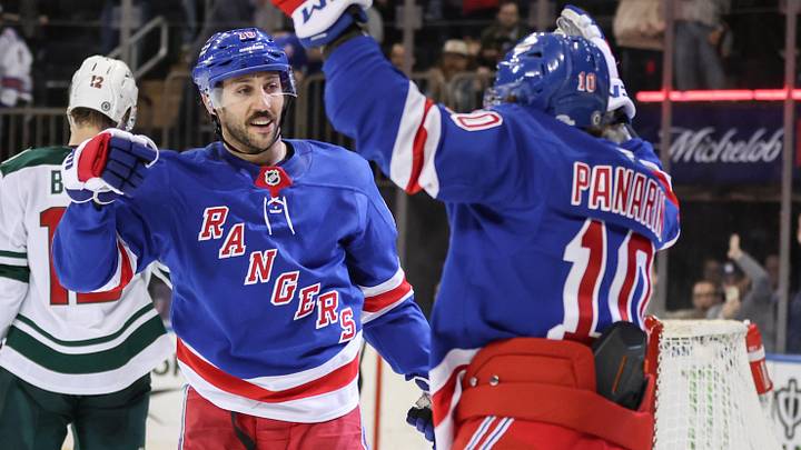Apr 2, 2025; New York, New York, USA;  New York Rangers center Vincent Trocheck (16) celebrates with left wing Artemi Panarin (10) after scoring the game winning goal in overtime against the Minnesota Wild at Madison Square Garden. Mandatory Credit: Wendell Cruz-Imagn Images