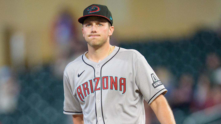 Sep 12, 2025; Minneapolis, Minnesota, USA; Arizona Diamondbacks starting pitcher Brandon Pfaadt (32) regroups after the Minnesota Twins score in the fourth inning at Target Field. Mandatory Credit: Matt Blewett-Imagn Images