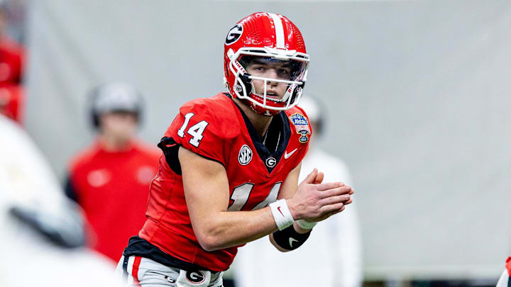 Jan 2, 2025; New Orleans, LA, USA; Georgia Bulldogs quarterback Gunner Stockton (14) looks on against the Notre Dame Fighting Irish during the second half at Caesars Superdome. Mandatory Credit: Stephen Lew-Imagn Images Jan 2, 2025; New Orleans, LA, USA; Georgia Bulldogs quarterback Gunner Stockton (14) looks on against the Notre Dame Fighting Irish during the second half at Caesars Superdome. Mandatory Credit: Stephen Lew-Imagn Images