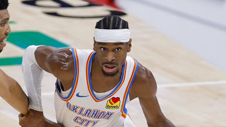 Jun 16, 2025; Oklahoma City, Oklahoma, USA; Oklahoma City Thunder guard Shai Gilgeous-Alexander (2) brings the ball up court past Indiana Pacers center Tony Bradley (13) during the second quarter in game five of the 2025 NBA Finals at Paycom Center. Mandatory Credit: Alonzo Adams-Imagn Images
