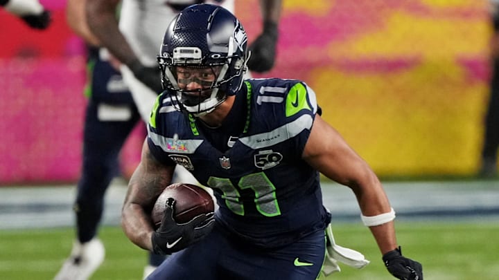Seattle Seahawks wide receiver Jaxon Smith-Njigba runs the ball during the third quarter against the New England Patriots.