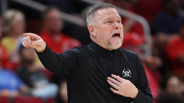 Mar 23, 2025; Houston, Texas, USA; Denver Nuggets head coach Michael Malone reacts during the third quarter against the Houston Rockets at Toyota Center. Mandatory Credit: Troy Taormina-Imagn Images