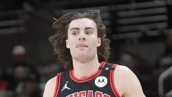 Apr 9, 2025; Chicago, Illinois, USA; Chicago Bulls guard Josh Giddey (3) gestures after making a three point basket against the Miami Heat during the second half at United Center. Mandatory Credit: David Banks-Imagn Images