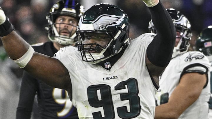 Dec 1, 2024; Baltimore, Maryland, USA;  Philadelphia Eagles defensive tackle Milton Williams (93) celebrates as Baltimore Ravens place kicker Justin Tucker (9) reacts to missing a second half field goal at M&T Bank Stadium. Mandatory Credit: Tommy Gilligan-Imagn Images