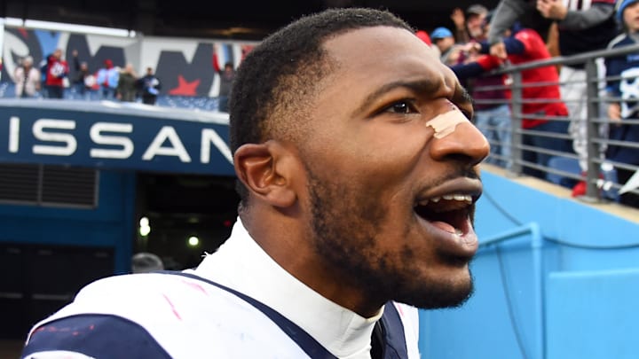 Dec 17, 2023; Nashville, Tennessee, USA; Houston Texans defensive end Jonathan Greenard (52) celebrates after a victory against the Tennessee Titans at Nissan Stadium. Mandatory Credit: Christopher Hanewinckel-Imagn Images