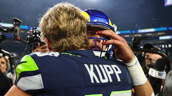 Jan 25, 2026; Seattle, WA, USA; Seattle Seahawks wide receiver Cooper Kupp (10) embraces Los Angeles Rams quarterback Matthew Stafford (9) after the 2026 NFC Championship Game at Lumen Field. Mandatory Credit: Kevin Ng-Imagn Images