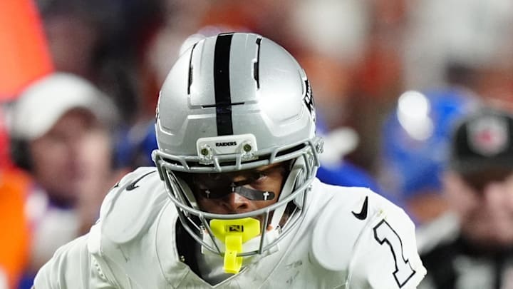 Nov 6, 2025; Denver, Colorado, USA; Las Vegas Raiders wide receiver Tre Tucker (1) runs with the ball after catch against the Denver Broncos during the first half at Empower Field at Mile High. Mandatory Credit: Ron Chenoy-Imagn Images Nov 6, 2025; Denver, Colorado, USA; Las Vegas Raiders wide receiver Tre Tucker (1) runs with the ball after catch against the Denver Broncos during the first half at Empower Field at Mile High. Mandatory Credit: Ron Chenoy-Imagn Images