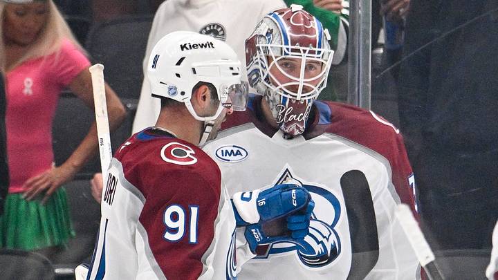 Oct 13, 2026; Dallas, Texas, USA; Colorado Avalanche center Nazem Kadri (91) and Mackenzie Blackwood (39) celebrate the victory over the Dallas Stars at the American Airlines Center. Mandatory Credit: Jerome Miron-Imagn Images