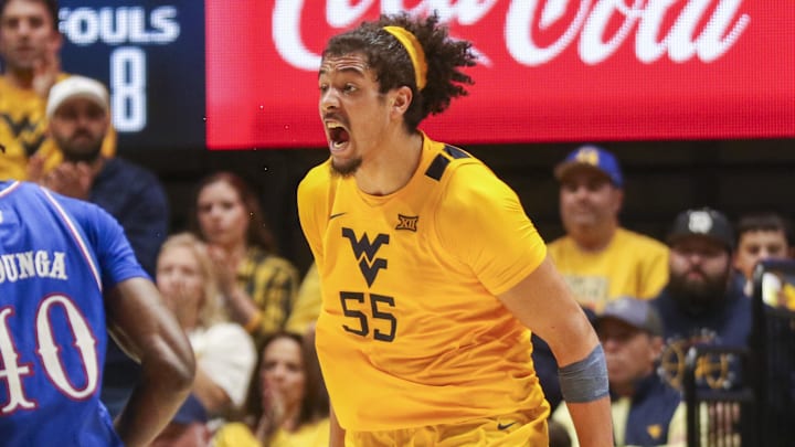 Jan 10, 2026; Morgantown, West Virginia, USA; West Virginia Mountaineers center Harlan Obioha (55) celebrates during the second half against the Kansas Jayhawks at Hope Coliseum. Mandatory Credit: Ben Queen-Imagn Images