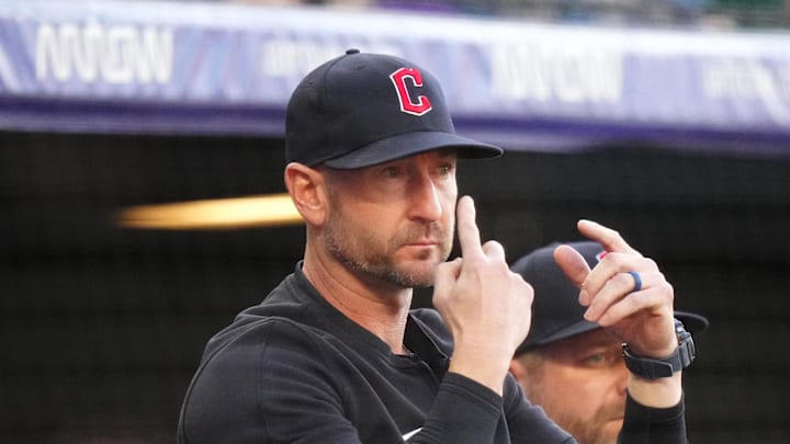 May 28, 2024; Denver, Colorado, USA; Cleveland Guardians bench coach Craig Albernaz (55) calls in a play in the first inning against the Colorado Rockies at Coors Field. Mandatory Credit: Ron Chenoy-Imagn Images
