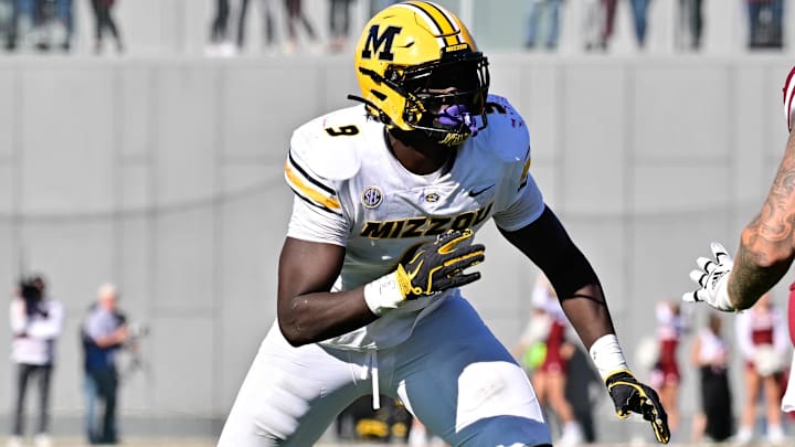Oct 12, 2024; Amherst, Massachusetts, USA; Missouri Tigers defensive end Zion Young (9) in action against the Massachusetts Minutemen during the second half at Warren McGuirk Alumni Stadium. Mandatory Credit: Eric Canha-Imagn Images