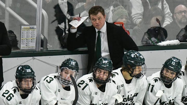 MSU hockey coach Adam Nightingale coaches his Spartans against U-M, Saturday, March 23, 2024, during the first period of the Big Ten hockey championship at Munn Ice Arena in East Lansing. MSU hockey coach Adam Nightingale coaches his Spartans against U-M, Saturday, March 23, 2024, during the first period of the Big Ten hockey championship at Munn Ice Arena in East Lansing.