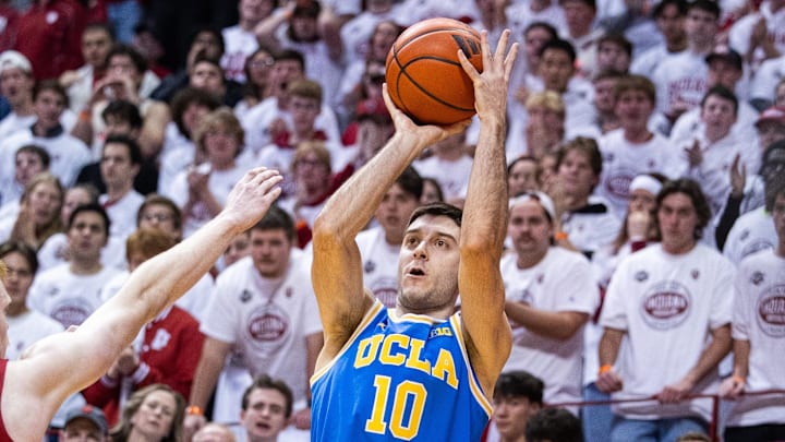 Feb 14, 2025; Bloomington, Indiana, USA; UCLA Bruins guard Lazar Stefanovic (10) shoots the ball while Indiana Hoosiers forward Luke Goode (10) defends in the second half at Simon Skjodt Assembly Hall. Mandatory Credit: Trevor Ruszkowski-Imagn Images Feb 14, 2025; Bloomington, Indiana, USA; UCLA Bruins guard Lazar Stefanovic (10) shoots the ball while Indiana Hoosiers forward Luke Goode (10) defends in the second half at Simon Skjodt Assembly Hall. Mandatory Credit: Trevor Ruszkowski-Imagn Images