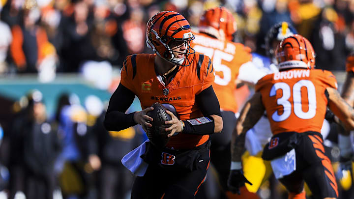 Dec 1, 2024; Cincinnati, Ohio, USA; Cincinnati Bengals quarterback Joe Burrow (9) runs with the ball against the Pittsburgh Steelers in the first half at Paycor Stadium. Mandatory Credit: Katie Stratman-Imagn Images Dec 1, 2024; Cincinnati, Ohio, USA; Cincinnati Bengals quarterback Joe Burrow (9) runs with the ball against the Pittsburgh Steelers in the first half at Paycor Stadium. Mandatory Credit: Katie Stratman-Imagn Images
