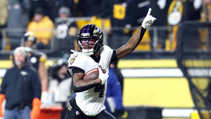Jan 4, 2026; Pittsburgh, Pennsylvania, USA; Baltimore Ravens wide receiver Zay Flowers (4) makes a touchdown catch against Pittsburgh Steelers cornerback Asante Samuel Jr. (not pictured) during the second half at Acrisure Stadium. Mandatory Credit: Charles LeClaire-Imagn Images