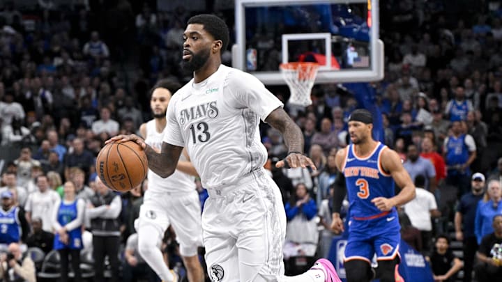 Nov 27, 2024; Dallas, Texas, USA; Dallas Mavericks forward Naji Marshall (13) brings the ball up court against the New York Knicks during the first quarter at the American Airlines Center. Mandatory Credit: Jerome Miron-Imagn Images