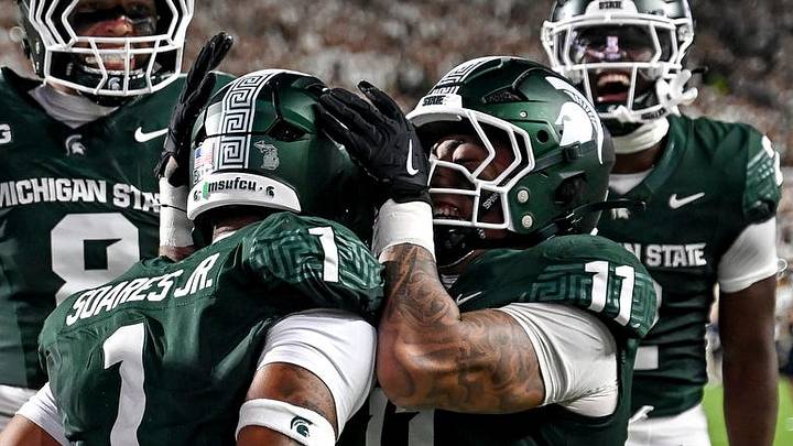 Michigan State’s Kenny Soares Jr., left, celebrates his interception with Anelu Lafaele during the second quarter in the game against Toledo on Friday, Sept. 4, 2026, at Spartan Stadium in East Lansing. Michigan State’s Kenny Soares Jr., left, celebrates his interception with Anelu Lafaele during the second quarter in the game against Toledo on Friday, Sept. 4, 2026, at Spartan Stadium in East Lansing.
