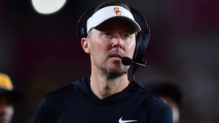 Nov 7, 2025; Los Angeles, California, USA; Southern California Trojans head coach Lincoln Riley watches game action against the Northwestern Wildcats during the second half at the Los Angeles Memorial Coliseum. Mandatory Credit: Gary A. Vasquez-Imagn Images Nov 7, 2025; Los Angeles, California, USA; Southern California Trojans head coach Lincoln Riley watches game action against the Northwestern Wildcats during the second half at the Los Angeles Memorial Coliseum. Mandatory Credit: Gary A. Vasquez-Imagn Images