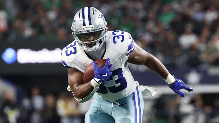 Nov 23, 2025; Arlington, Texas, USA; Dallas Cowboys running back Javonte Williams (33) runs with the ball in the second quarter against the Philadelphia Eagles at AT&T Stadium. Mandatory Credit: Kevin Jairaj-Imagn Images