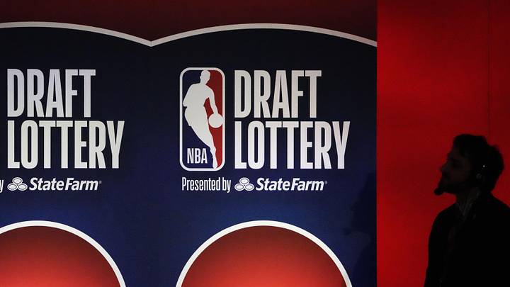 May 12, 2025; Chicago, Illinois, US; A person watches the 2025 NBA Draft Lottery at McCormick Place. Mandatory Credit: David Banks-Imagn Images