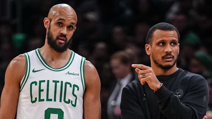 Apr 7, 2026; Boston, Massachusetts, USA; Boston Celtics head coach Joe Mazzulla with guard Derrick White (9) from the sideline as they take on the Charlotte Hornets at TD Garden. Mandatory Credit: David Butler II-Imagn Images
