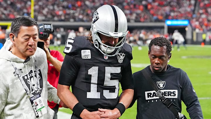 Nov 24, 2024; Paradise, Nevada, USA; Las Vegas Raiders quarterback Gardner Minshew (15) heads for the locker room after sustaining an apparent injury during a play against the Denver Broncos during the fourth quarter at Allegiant Stadium. Mandatory Credit: Stephen R. Sylvanie-Imagn Images Nov 24, 2024; Paradise, Nevada, USA; Las Vegas Raiders quarterback Gardner Minshew (15) heads for the locker room after sustaining an apparent injury during a play against the Denver Broncos during the fourth quarter at Allegiant Stadium. Mandatory Credit: Stephen R. Sylvanie-Imagn Images