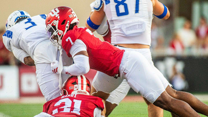 Indiana football safety Louis Moore (7) tackles Indiana State's Larry Stephens III (3) Sept. 12, 2025, at Memorial Stadium. Indiana football safety Louis Moore (7) tackles Indiana State's Larry Stephens III (3) Sept. 12, 2025, at Memorial Stadium.