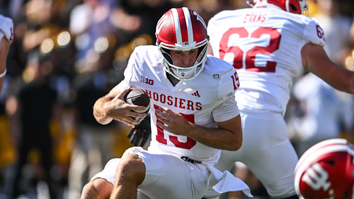 Fernando Mendoza and Indiana defeated Iowa on the road Saturday