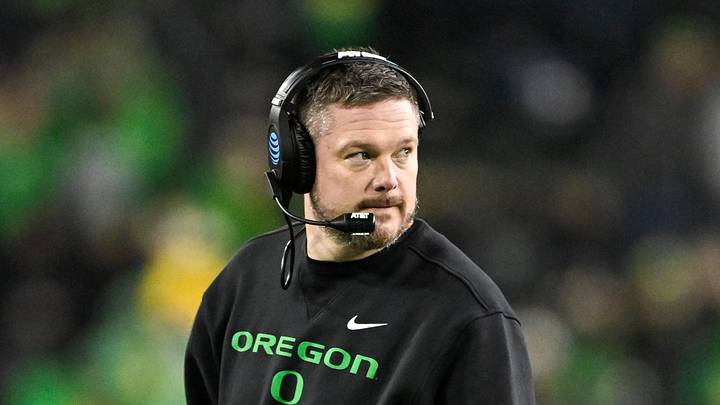 Dec 20, 2025; Eugene, OR, USA;  Oregon Ducks head coach Dan Lanning looks on during the fourth quarter against the James Madison Dukes at Autzen Stadium. Mandatory Credit: Craig Strobeck-Imagn Images