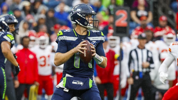 Aug 15, 2025; Seattle, Washington, USA; Seattle Seahawks quarterback Sam Darnold (14) looks to pass against the Kansas City Chiefs during the first quarter at Lumen Field. Aug 15, 2025; Seattle, Washington, USA; Seattle Seahawks quarterback Sam Darnold (14) looks to pass against the Kansas City Chiefs during the first quarter at Lumen Field.