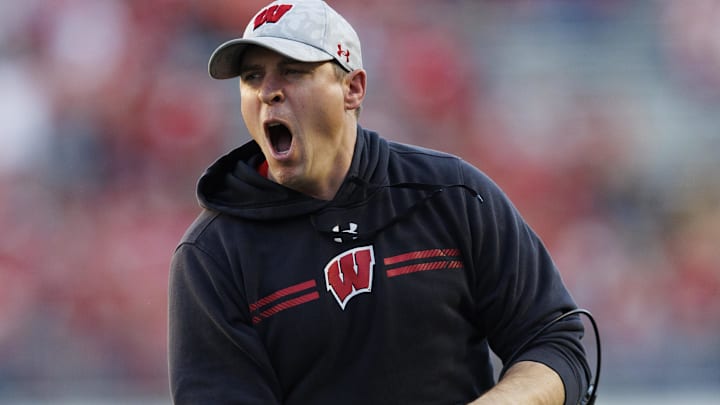 Wisconsin Badgers head coach Jim Leonhard reacts to a call during the fourth quarter against the Purdue Boilermakers. Wisconsin Badgers head coach Jim Leonhard reacts to a call during the fourth quarter against the Purdue Boilermakers.