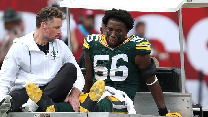 Green Bay Packers linebacker Edgerrin Cooper (56) is carted off the field during the game against the Tampa Bay Buccaneers. Green Bay Packers linebacker Edgerrin Cooper (56) is carted off the field during the game against the Tampa Bay Buccaneers.