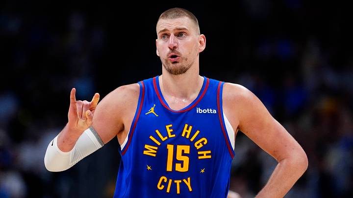 Apr 20, 2026; Denver, Colorado, USA; Denver Nuggets center Nikola Jokic (15) reacts towards the bench in the second half against the Minnesota Timberwolves during game two of the first round of the 2026 NBA Playoffs at Ball Arena. Mandatory Credit: Ron Chenoy-Imagn Images