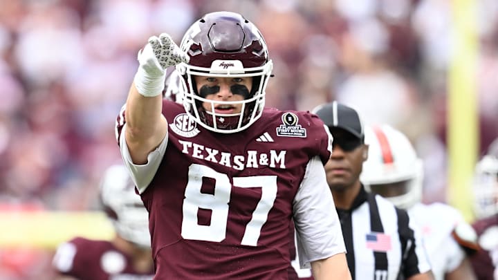 Dec 20, 2025; College Station, TX, USA; Texas A&M Aggies tight end Nate Boerkircher (87) celebrates a first down against the Miami Hurricanes during first quarter of the first round game of the CFP National Playoff at Kyle Field. Mandatory Credit: Maria Lysaker-Imagn Images