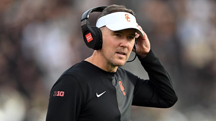 Sep 13, 2025; West Lafayette, Indiana, USA; Southern California Trojans head coach Lincoln Riley stands on the sidelines during the first quarter against the Purdue Boilermakers at Ross-Ade Stadium. Mandatory Credit: Marc Lebryk-Imagn Images