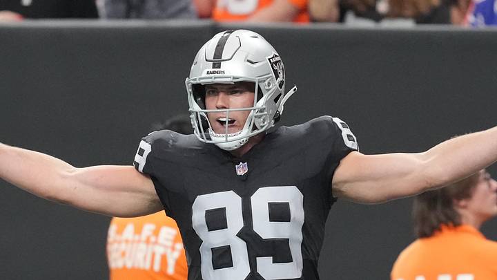 Dec 7, 2025; Paradise, Nevada, USA;  Las Vegas Raiders tight end Brock Bowers (89) reacts after catching a touchdown against the Denver Broncos during the first half at Allegiant Stadium. Mandatory Credit: Kirby Lee-Imagn Images