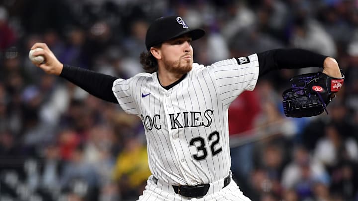 Colorado Rockies pitcher Chase Dollander (32) pitches at Coors Field. 