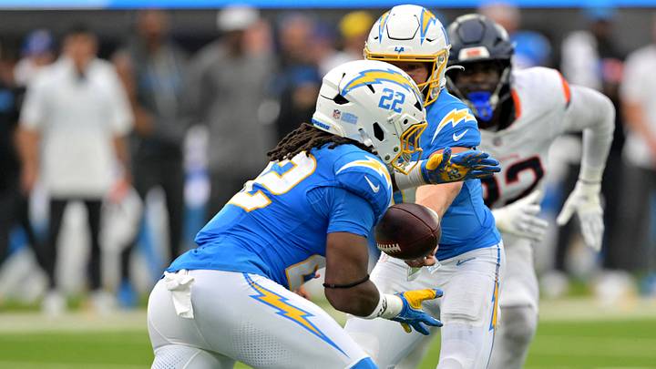 Sep 21, 2025; Inglewood, California, USA; Los Angeles Chargers running back Najee Harris (22) takes a hand off from quarterback Justin Herbert (10) and runs for a first down in the first quarter against the Denver Broncos at SoFi Stadium. Mandatory Credit: Jayne Kamin-Oncea-Imagn Images Sep 21, 2025; Inglewood, California, USA; Los Angeles Chargers running back Najee Harris (22) takes a hand off from quarterback Justin Herbert (10) and runs for a first down in the first quarter against the Denver Broncos at SoFi Stadium. Mandatory Credit: Jayne Kamin-Oncea-Imagn Images