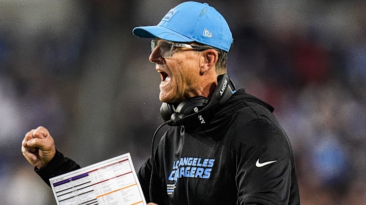 Los Angeles Chargers head coach Jim Harbaugh celebrates a touchdown against the Detroit Lions.