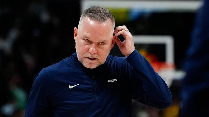 Mar 15, 2025; Denver, Colorado, USA; Denver Nuggets head coach Michael Malone following a timeout in the fourth quarter against the Washington Wizards at Ball Arena. Mandatory Credit: Ron Chenoy-Imagn Images Mar 15, 2025; Denver, Colorado, USA; Denver Nuggets head coach Michael Malone following a timeout in the fourth quarter against the Washington Wizards at Ball Arena. Mandatory Credit: Ron Chenoy-Imagn Images