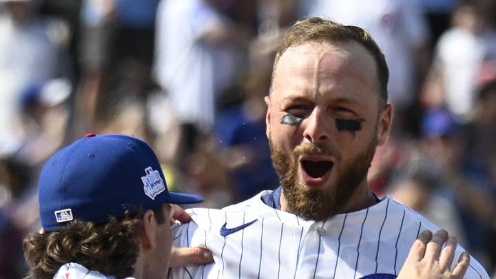 Jun 6, 2026; Chicago, Illinois, USA; Chicago Cubs pitcher Ryan Rolison (33) pushes first baseman Michael Busch (29) after Busch hit a walk off single during the tenth inning against the San Francisco Giants at Wrigley Field. Mandatory Credit: Matt Marton-Imagn Images Jun 6, 2026; Chicago, Illinois, USA; Chicago Cubs pitcher Ryan Rolison (33) pushes first baseman Michael Busch (29) after Busch hit a walk off single during the tenth inning against the San Francisco Giants at Wrigley Field. Mandatory Credit: Matt Marton-Imagn Images