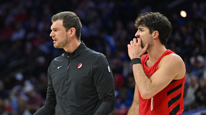 Mar 15, 2026; Philadelphia, Pennsylvania, USA; Portland Trail Blazers head Tiago Splitter and forward Deni Avdija (8). Mandatory Credit: Eric Hartline-Imagn Images Mar 15, 2026; Philadelphia, Pennsylvania, USA; Portland Trail Blazers head Tiago Splitter and forward Deni Avdija (8). Mandatory Credit: Eric Hartline-Imagn Images